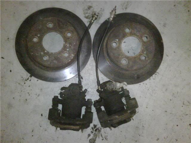 http://i279.photobucket.com/albums/kk121/zenkiS14-5/S14rearCalipersRotors.jpg