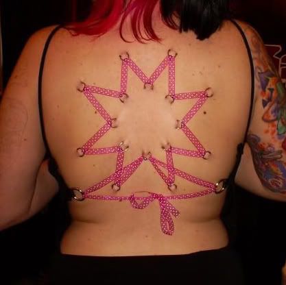 Nice Twist On A Corset Piercing Wants Diagonally Parked In A Parallel 