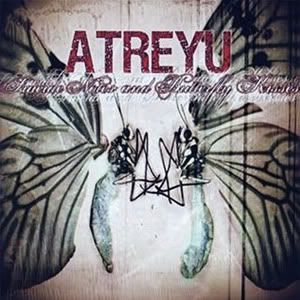 atreyu lip gloss and black pose